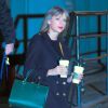 Taylor Swift sort de chez elle avec son père Scott et son frère Austin à New York, le 1er janvier 2015. 