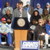 Eli Manning et les Giants de New York célébrant leur victoire au Super Bowl dans les rues de New York le 7 février 2012