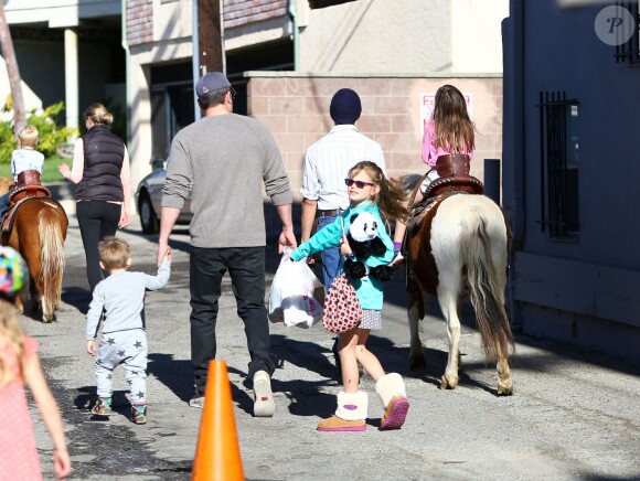 Please hide the children's faces prior to the publication. Actor Ben Affleck who is set to star in the Batman v Superman movie spends some quality time with his kids by taking them to the local Farmers Market in Pacific Palisades, Los Angeles, CA, USA on February 1, 2015. The hunky star showed off his muscular physique in a tight-fitting light sweater while he kept his watchful eye on his children. Photo by GSI/ABACAPRESS.COM02/02/2015 - Los Angeles