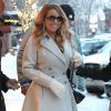 Mariah Carey fait du shopping en bottines Louboutin dans les rues enneigées de Aspen, le 23 décembre 2014 