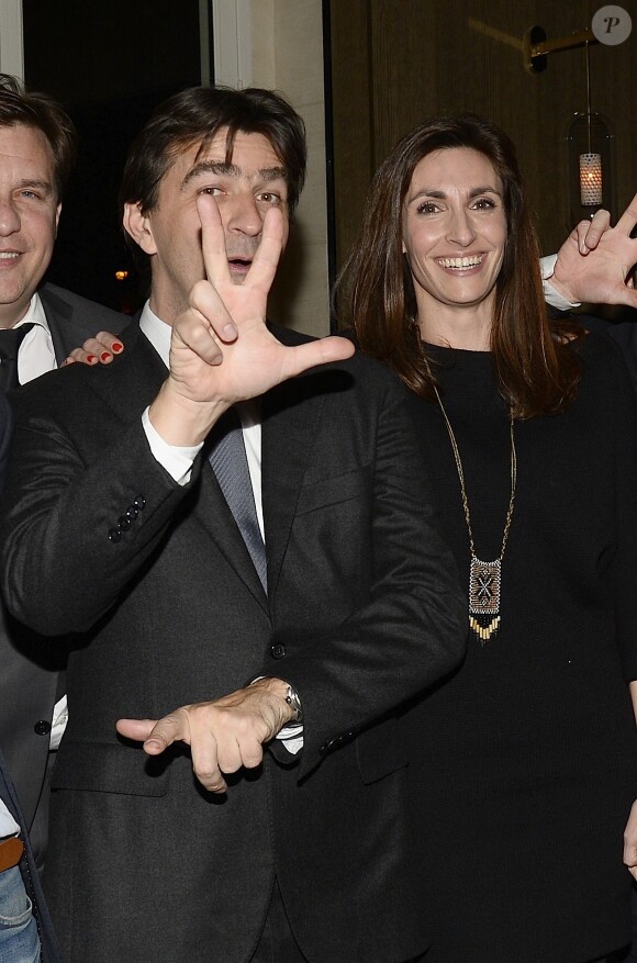 Yannick Alléno avec sa femme Laurence Bonnel et son équipe célèbrent les trois étoiles du Guide Michelin au Victoria Club à Paris, le 2 février 2015