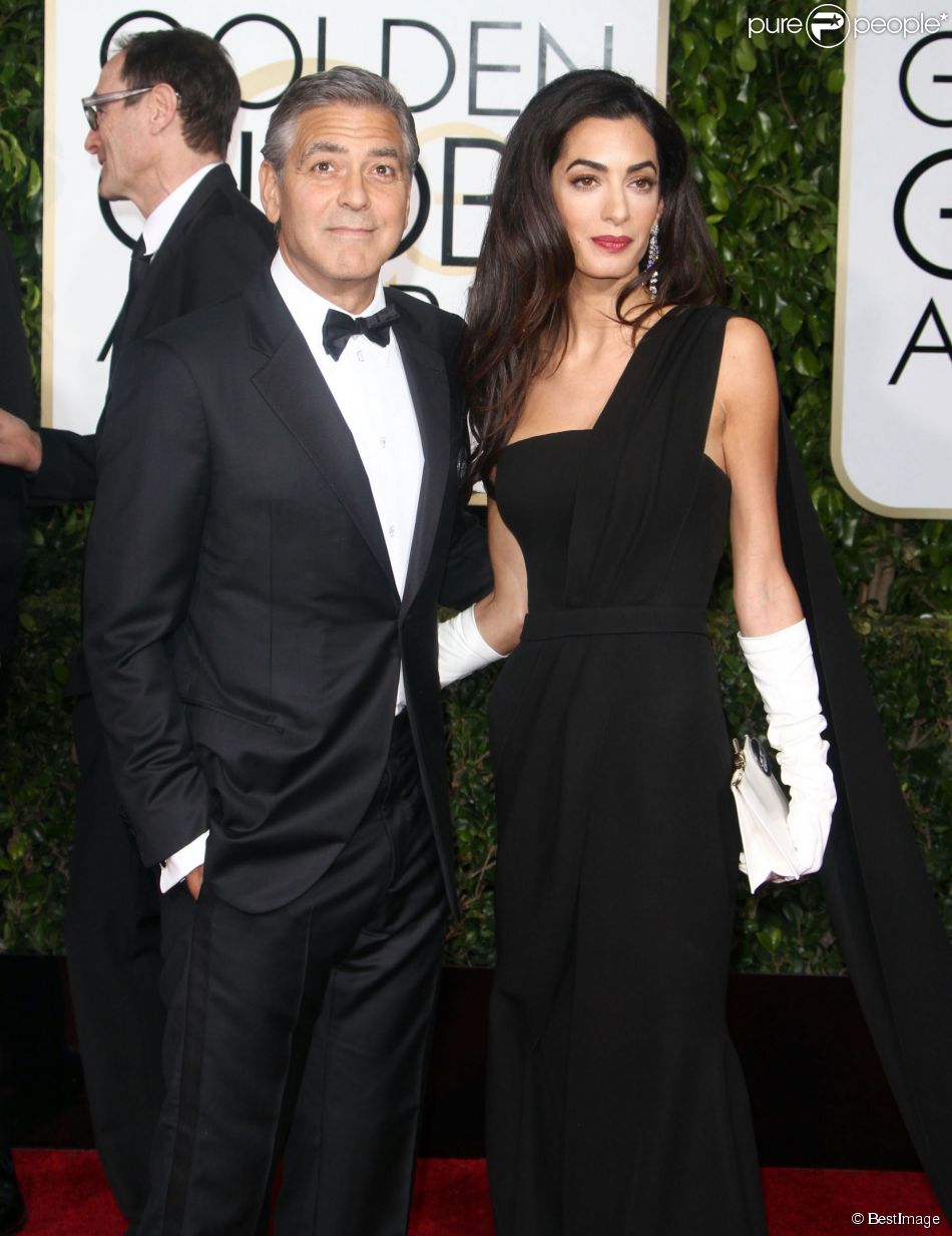 George Clooney et sa femme Amal Alamuddin (robe Dior Haute Couture) aux Golden Globe Awards à Beverly Hills, le 11 janvier 2015.