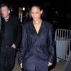Rihanna se rend à la soirée post-Grammys d'Universal Music Group, habillée d'un costume haute couture Maison Margiela (collection printemps-été 2015) et de souliers blancs Christian Louboutin. Los Angeles, le 8 février 2015.