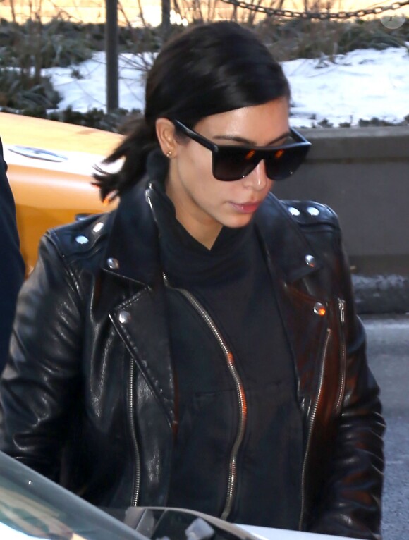 Kim Kardashian sort avec son mari Kanye West dans New York, le 11 février 2015.  