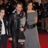 Florent Pagny, sa femme Azucena et leur fille Ael lors des NRJ Music Awards à Cannes, le 14 décembre 2013.