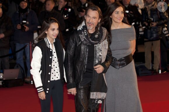 Florent Pagny, sa femme Azucena et leur fille Ael lors des NRJ Music Awards à Cannes, le 14 décembre 2013.