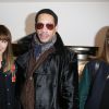 JoeyStarr entre Les Brigittes (Sylvie Hoarau et Aurélie Saada) lors du Lancement de l'enceinte "Phantom", Implosive Sound Center, créée par Devialet, et rencontre avec les fondateurs de la marque, chez Colette à Paris, le 16 février 2015.