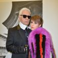 Karl Lagerfeld et Noomi Rapace assistent au défilé Fendi automne-hiver 2015-2016 à Milan. Le 26 février 2015.