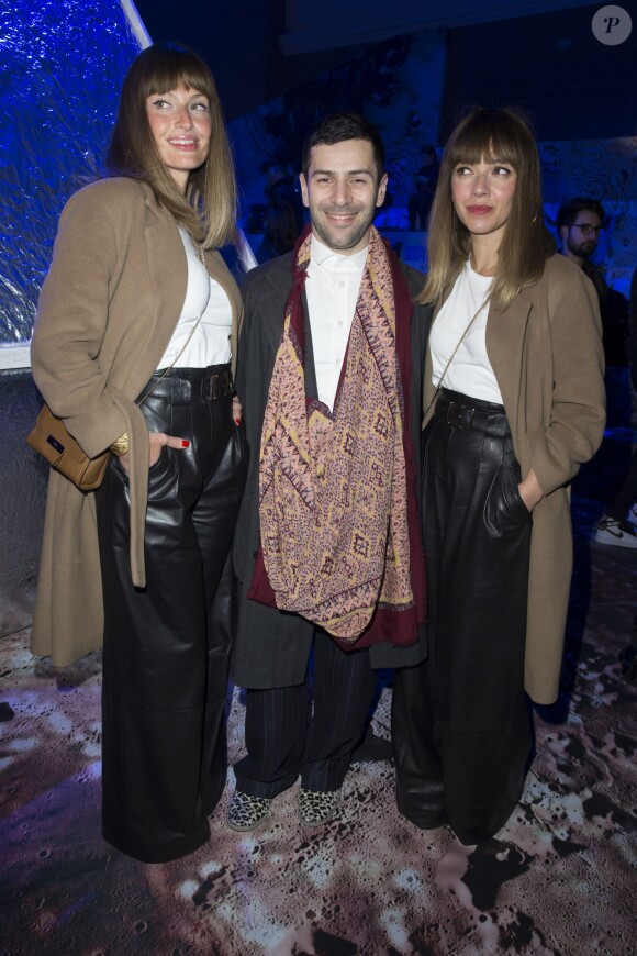 Aurélie Saada, Alexis Mabille et Sylvie Hoarau assistent au défilé H&M Studio automne-hiver 2015-2016 au Grand Palais. Paris, le 4 mars 2015.