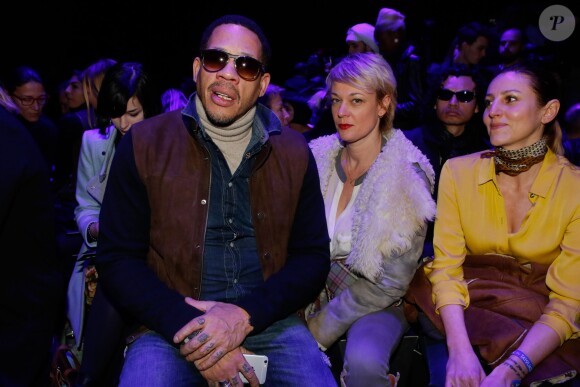 JoeyStarr (Joey Starr) - People en front row au défilé de mode "Fatima Lopes", collection prêt-à-porter automne-hiver 2015/2016 à la Tour Eiffel, à Paris. Le 7 mars 2015
