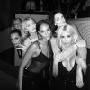 Gigi Hadid, Cara Delevingne, Lily Donaldson, Joan Smalls, Kendall Jenner et Kim Kardashian assistent au concert de Kanye West dans l'Auditorium de la Fondation Louis Vuitton. Paris, le 10 mars 2015.