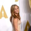 Jennifer Aniston dans une robe Atelier Versace - 87e cérémonie des Oscars à Los Angeles le 22 février 2015