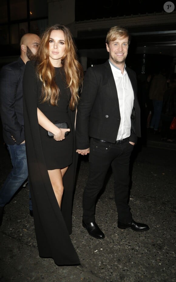 Jodi Albert et son mari Kian Egan à la sortie de l'After-Party de la soirée des Brit Awards à Londres, le 19 février 2014. 
