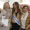 Valérie Trierweiler, Miss Beauvaisis 2015 et Saïda Jawad à la soirée d'ouverture de la Foire du Trône, organisée au profit du Secours populaire à Paris le 27 mars 2015.