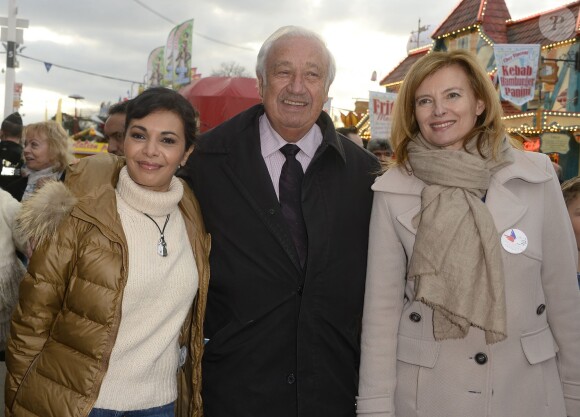 Saïda Jawad, Marcel Campion et Valérie Trierweiler à la soirée d'ouverture de la Foire du Trône, organisée au profit du Secours populaire à Paris le 27 mars 2015.