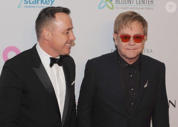 David Furnish et Elton John lors de la soirée "Elton John AIDS Foundation" à New York le 15 octobre 2013