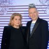 Catherine Deneuve and Jean Paul Gaultier - Photocall de la soirée de vernissage de l'exposition "Jean Paul Gaultier" au Grand Palais à Paris, le 30 mars 2015.