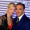 Tina Grigoriou et Nikos Aliagas - Photocall de la soirée de vernissage de l'exposition "Jean Paul Gaultier" au Grand Palais à Paris, le 30 mars 2015.