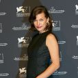  Milla Jovovich enceinte - Soir&eacute;e Jaeger-LeCoultre &agrave; l'occasion du 71e festival international du film de Venise le 2 septembre 2014. 
