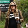 Abbey Clancy, sublime future maman à la Hampstead Heath Fair de Londres, le 5 avril 2015