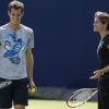Le tennisman britannique Andy Murray et Amélie Mauresmo pour leur premier entraînement au Queen's à Londres le 11 juin 2014.