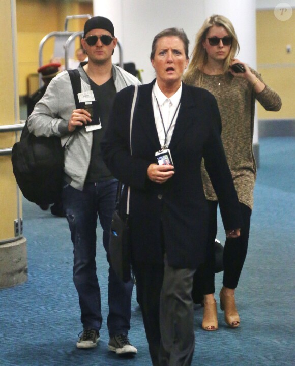 Michael Bublé arrive à l'aéroport de Vancouver en provenance de Rio de Janeiro où il a passé ses vacances en famille, le 25 septembre 2014.