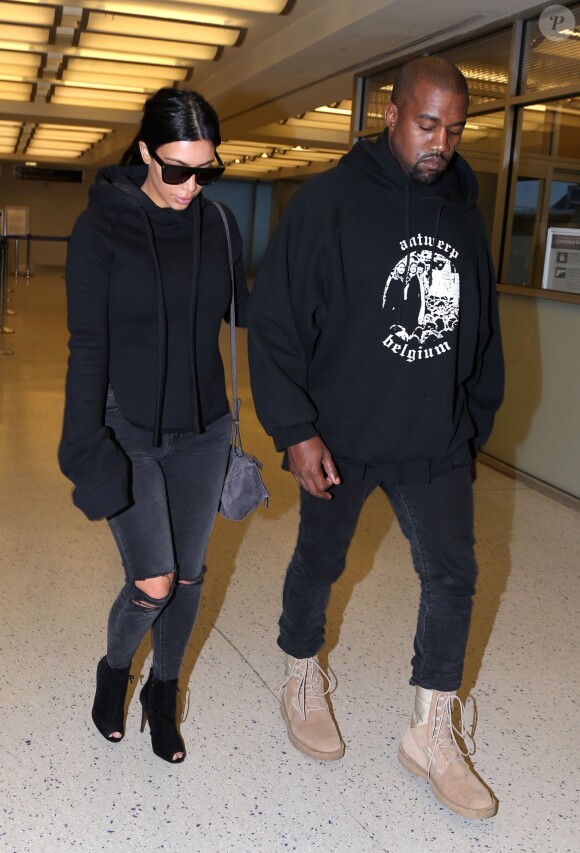 Kim Kardashian et Kanye West à l'aéroport JFK à New York, le 21 avril 2015.