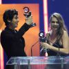 Cara Delevingne et Nat Wolff se partagent le prix d'Étoiles Montantes aux CinemaCon Big Screen Achievement Awards au Caesars Palace. Las Vegas, le 23 avril 2015.
