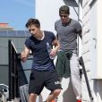 David Beckham et son fils Brooklyn sortent de leur cours de gym à Brentwood, le 8 avril 2014.