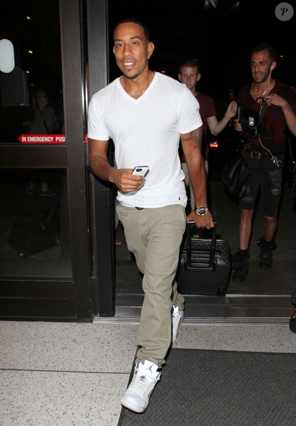 Le rappeur et acteur Ludacris arrive à l'aéroport LAX de Los Angeles pour prendre un avion. Le 17 août 2014 