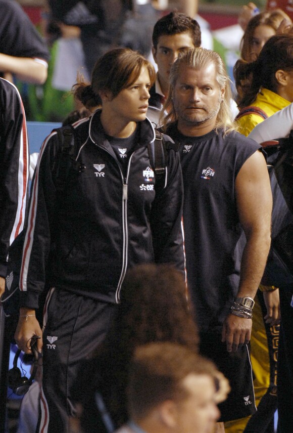 Laure Manaudou et Philippe Lucas lors des championnats du monde de natation à la Rod Laver Arena de Melbourne, le 25 mars 2007