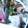Exclusif - Anthony Kiedi, du groupe Red Hot Chili Peppers, est allé chercher son fils Everly en voiture de golf avec sa petite amie Helena à Malibu. Le jeune Everly est heureux de conduire la petite voiture. Le 29 octobre 2014.