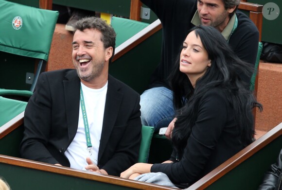 Arnaud Lagardère et sa femme Jade Foret aux Internationaux de France de tennis de Roland Garros à Paris, le 29 mai 2014