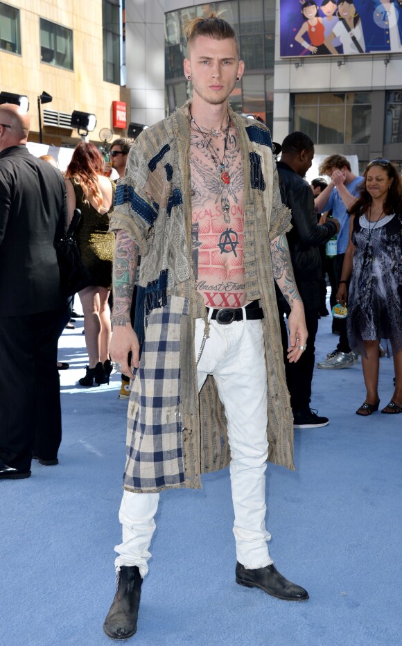 Machine Gun Kelly aux MTV Movie Awards 2015. Los Angeles, le 12 avril 2015.