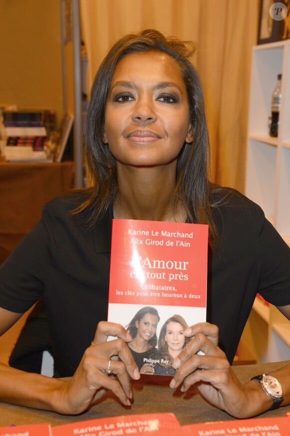 Karine le Marchand - 34e édition du Salon du Livre à Paris Porte de Versailles le 21 mars 2014.