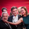 Carole Bouquet, son compagnon Philippe Sereys de Rothschild et Paul Rassam - Descente des marches du film "Le Petit Prince" lors du 68e Festival International du Film de Cannes le 22 mai 2015