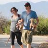 Exclusif - Milla Jovovich très enceinte fait de la randonnée avec son mari Paul W.S Anderson et leurs chiens à Los Angeles, le 24 mars 2015.  