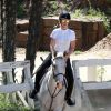Exclusif - Iggy Azalea fait du cheval dans un ranch à Los Angeles, le 30 mars 2015. 