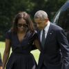 Michelle Obama et son mari Barack Obama à la sortie d'un Marine One marchent jusqu'à la Maison Blanche, le 6 juin 2015. Le président Obama s'est rendu à ilmington dans le Delaware samedi matin pour faire l'éloge funèbre de Beau Biden.