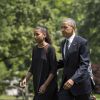 Sasha Obama, Michelle Obama et son mari Barack Obama à la sortie d'un Marine One marchent jusqu'à la Maison Blanche, le 6 juin 2015. Le président Obama s'est rendu à ilmington dans le Delaware samedi matin pour faire l'éloge funèbre de Beau Biden.