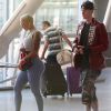 Exclusif - Amber Rose et son nouveau petit ami Machine Gun Kelly arrivent à l'aéroport JFK de New York, le 9 juin 2015.