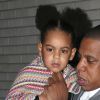 Beyonce Knowles, Jay-Z et leur fille Blue Ivy Carter à la sortie de la première de "Annie" à New York, le 7 décembre 2014 