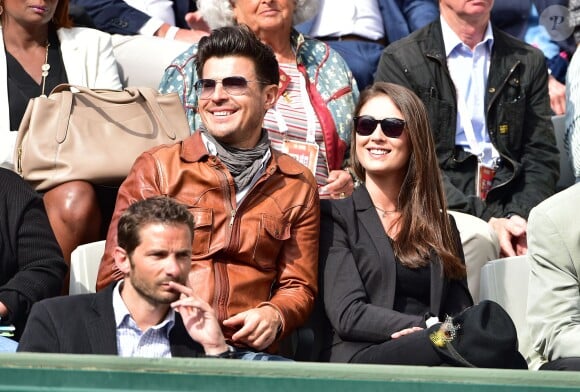 Vincent Niclo et une amie - People dans les tribunes lors du tournoi de tennis de Roland-Garros à Paris, le 28 mai 2015.  