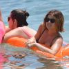 Exclusif - Lucy Hale se baigne sur une plage lors de ses vacances à Hawaï, le 2 juillet 2015.