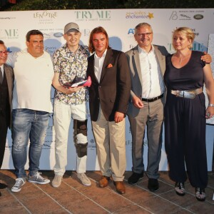 Jean-Marc Généreux et Philippe Peyrard, lors de la soirée caritative annuelle Try Me en faveur des enfants hospitalisés, à Mougins, le 3 juillet 2015.