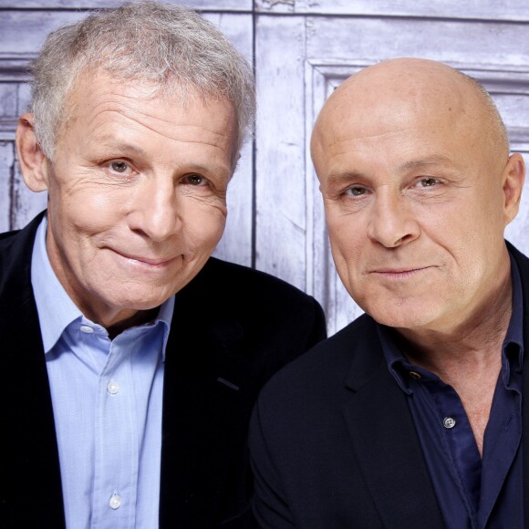 Patrick Poivre d'Arvor et de son frère Olivier Poivre d'Arvor à Paris, le 20 novembre 2014.