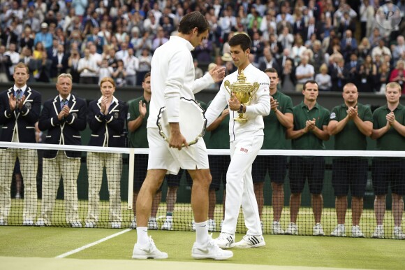 Novak Djokovic of Serbia with the trophy after he wins the men final against Roger Federer of SWISS at the Wimbledon Championships in London, Great Britain on JULY, 12, 2015. Photo by Corinne Dubreuil/ABACAPRESS.COM12/07/2015 - London
