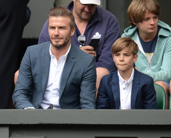 David Beckham et son fils Romeo - People assistent au tournoi de tennis de Wimbledon le 8 juillet 2015