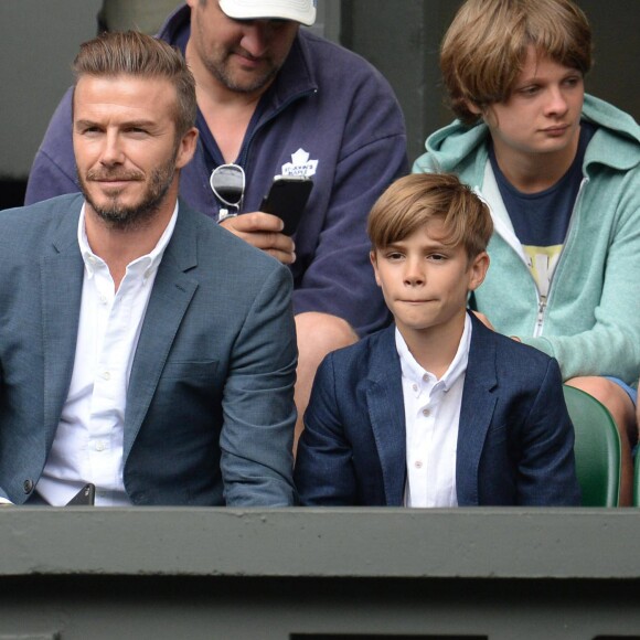 David Beckham et son fils Romeo - People assistent au tournoi de tennis de Wimbledon le 8 juillet 2015