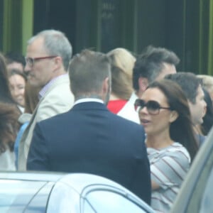 Exclusif - David Beckham, sa femme Victoria Beckham et leur fille Harper Seven Beckham vont à la soirée pour les parents de l'école de Harper Seven à Londres, le 7 juillet 2015. 